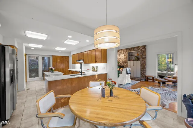 a bathroom with a shower and a sink