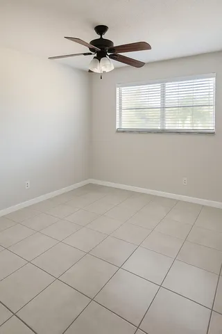 a view of a room that has a window in it