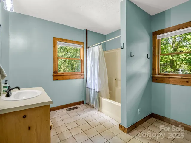 a view of a storage & utility room with a window