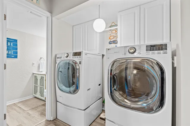 a view of a livingroom with furniture and wooden floor