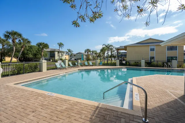 a view of a house with a swimming pool