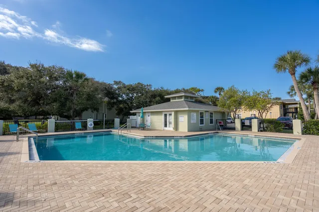 a view of a house with swimming pool