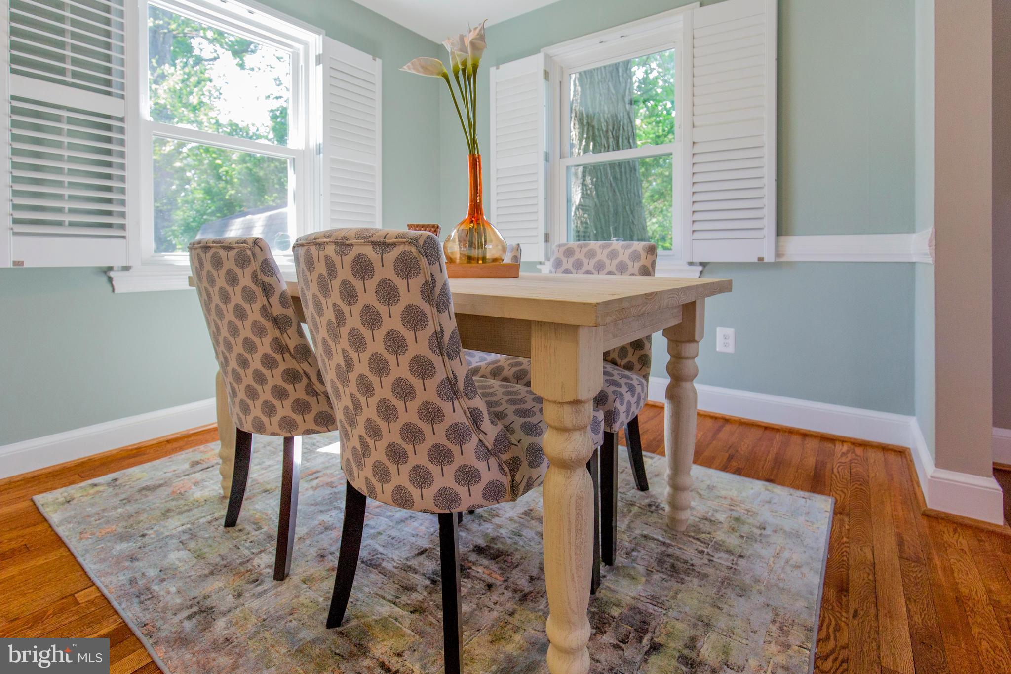 9010 Eton Road Silver Spring, MD 20901 - Photo 12 of 30 a dining room with furniture and window