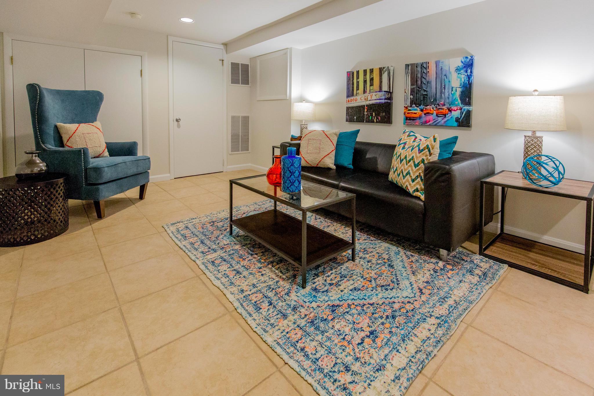 9010 Eton Road Silver Spring, MD 20901 - Photo 25 of 30 a living room with furniture and a couch