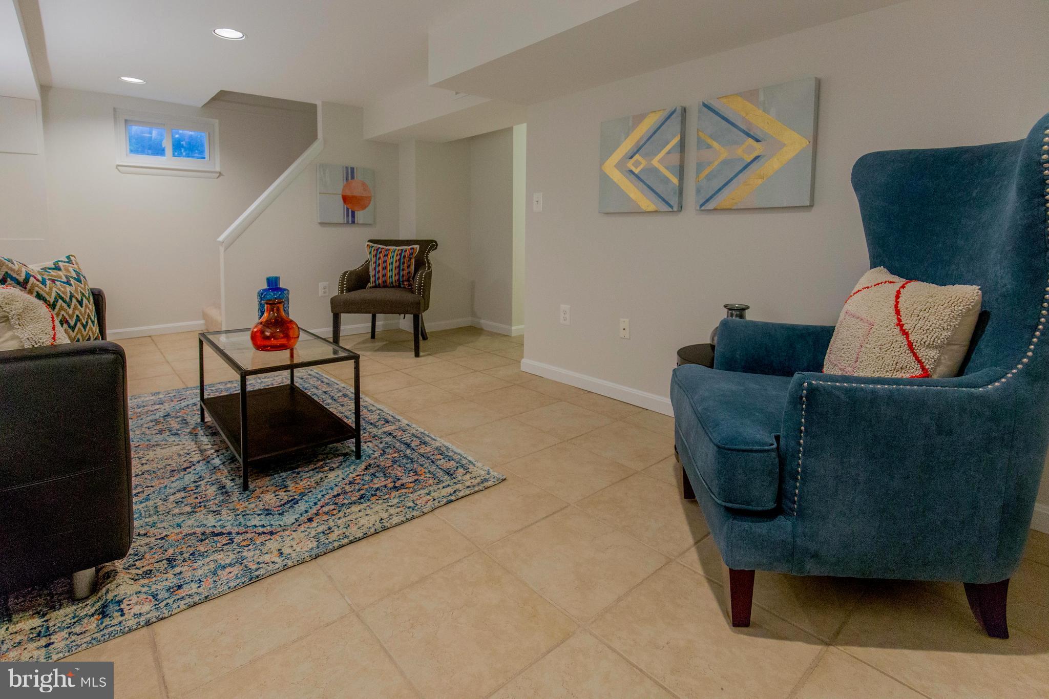 9010 Eton Road Silver Spring, MD 20901 - Photo 27 of 30 a living room with furniture and a couch