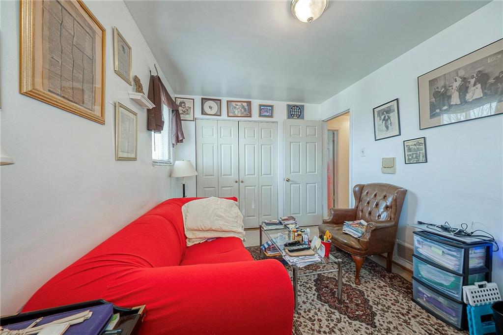 923 Locust Street Coraopolis, PA 15108 - Photo 15 of 27 a living room with furniture and a window