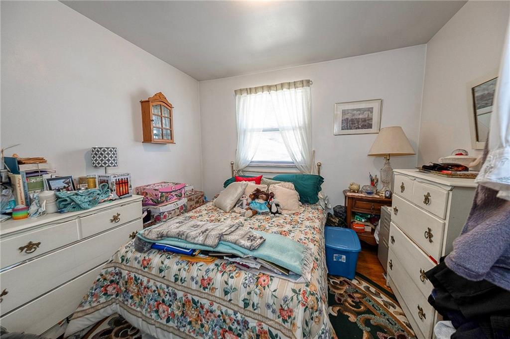 923 Locust Street Coraopolis, PA 15108 - Photo 10 of 27 a bedroom with furniture and a window