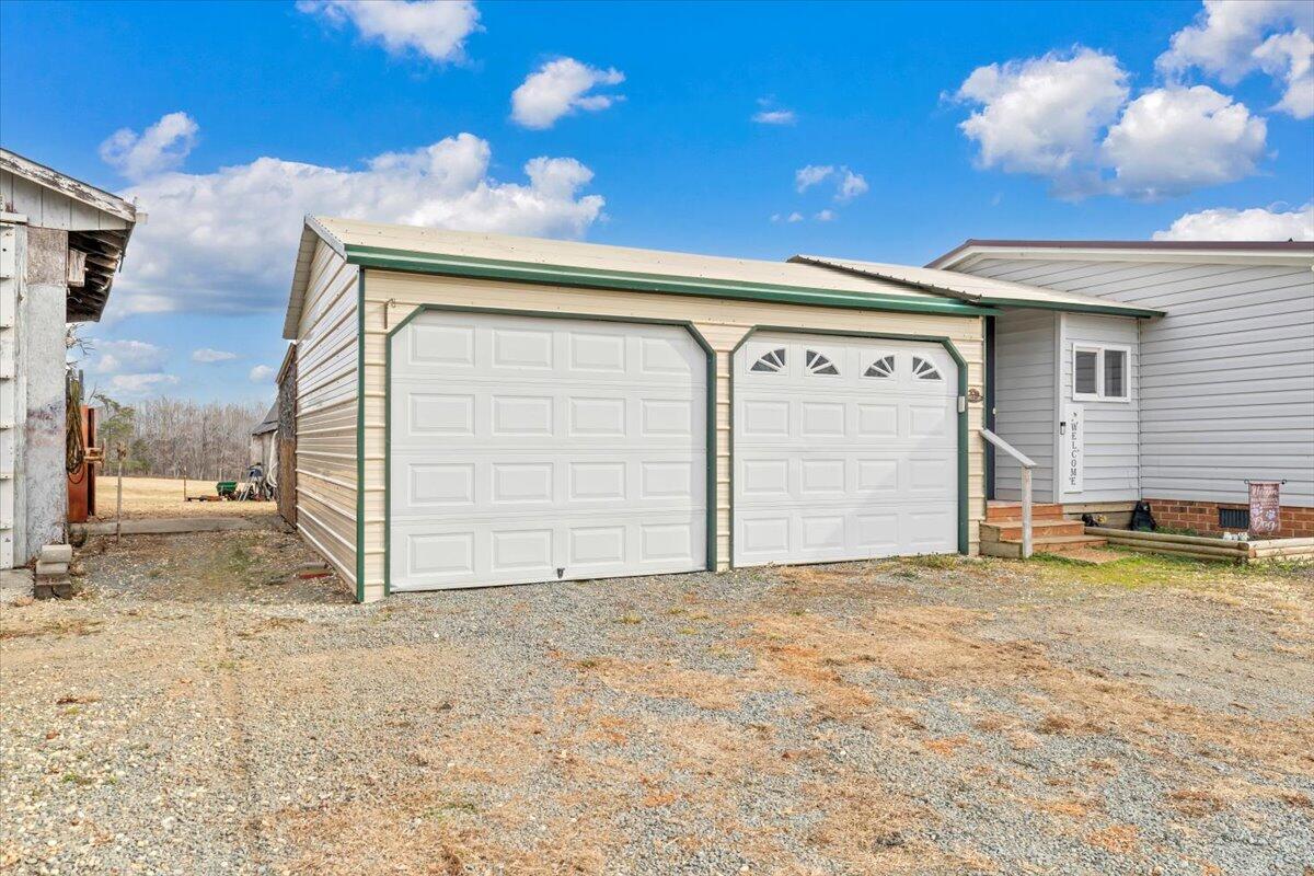627-641 Novelty Road Penhook, VA 24137 - Photo 50 of 64 a view of a house with a garage
