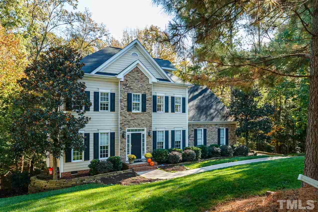 2936 Sunnystone Way Raleigh, NC 27613 - Photo 1 of 29 a front view of a house with a yard