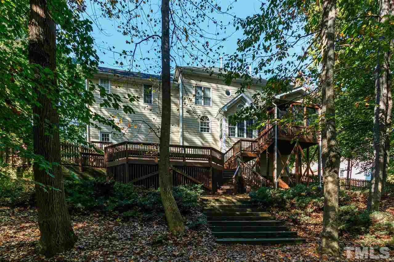 2936 Sunnystone Way Raleigh, NC 27613 - Photo 28 of 29 a view of a house with a tree