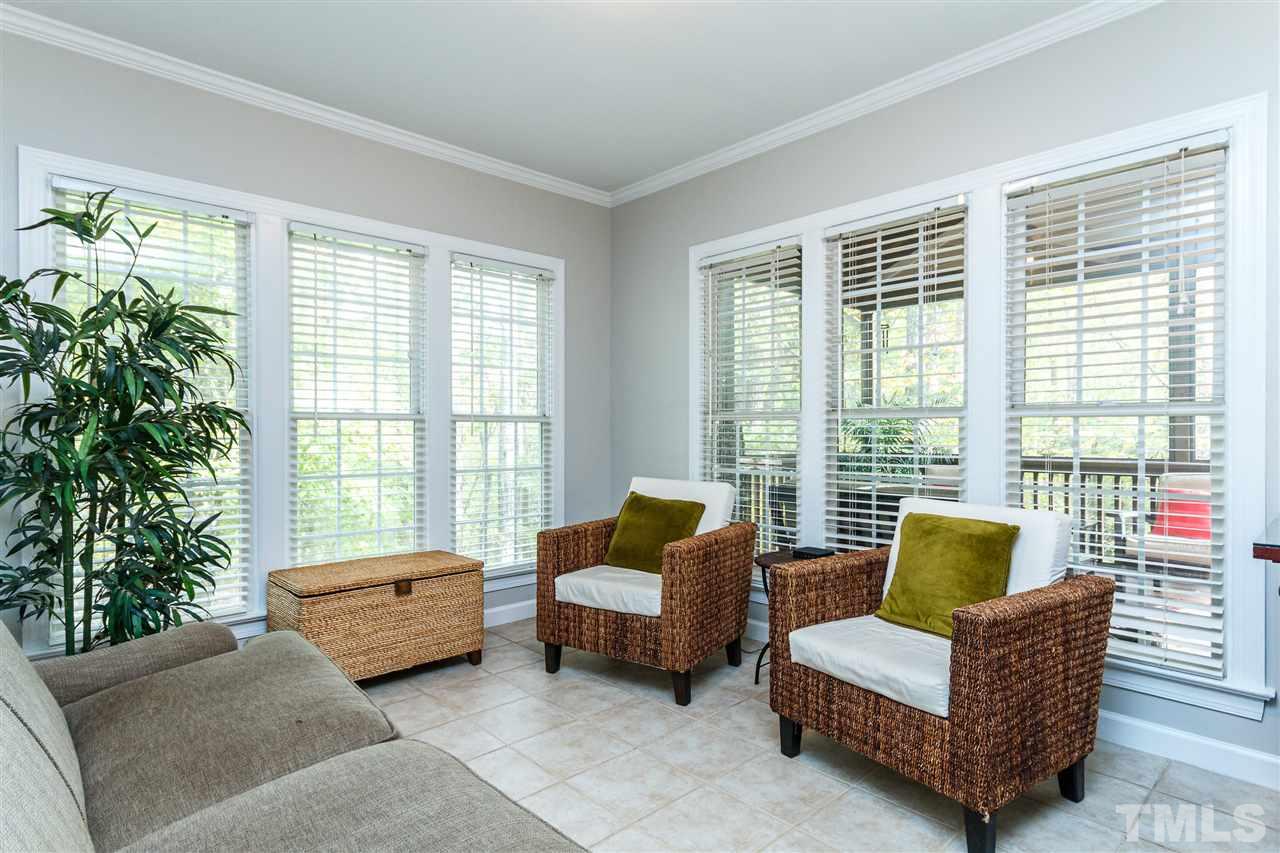 2936 Sunnystone Way Raleigh, NC 27613 - Photo 7 of 29 a living room with furniture and windows