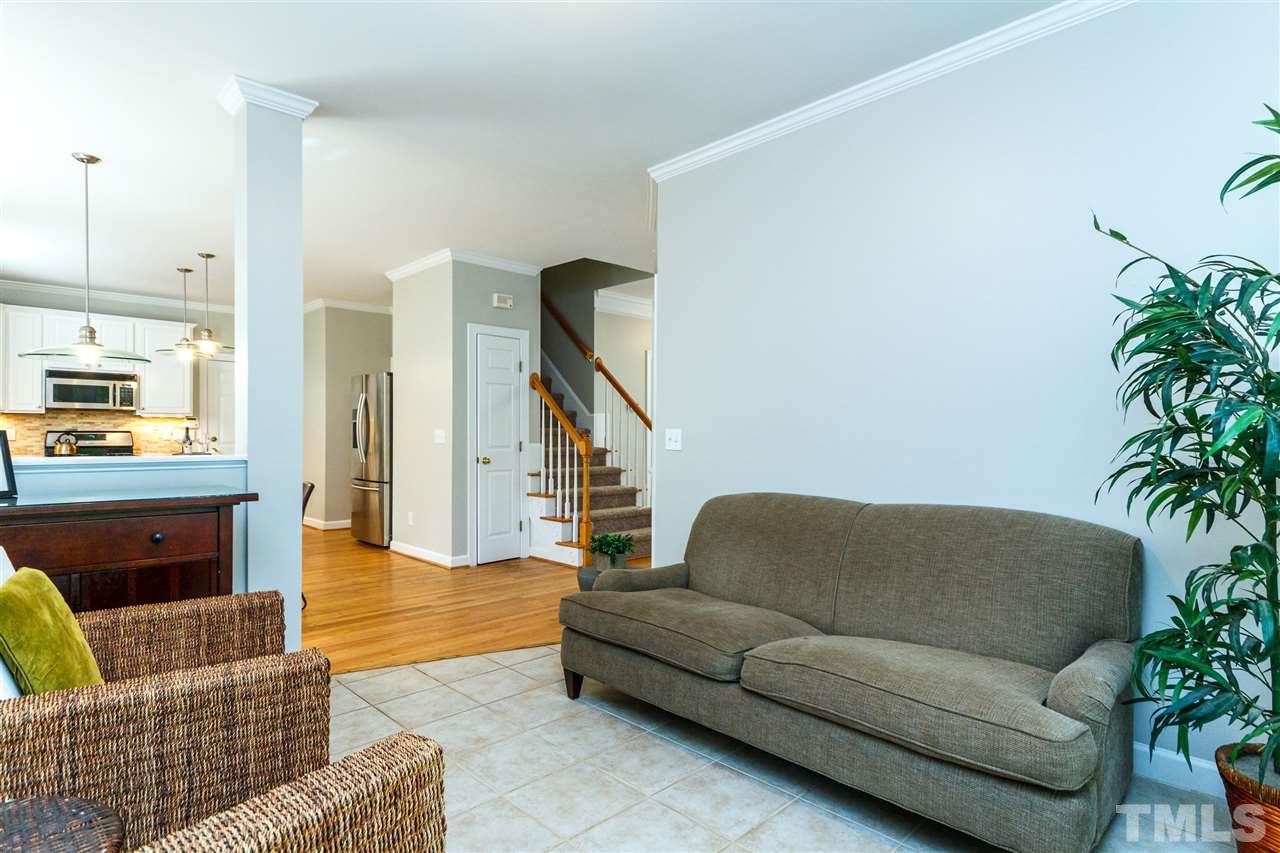 2936 Sunnystone Way Raleigh, NC 27613 - Photo 8 of 29 a living room with furniture and a couch