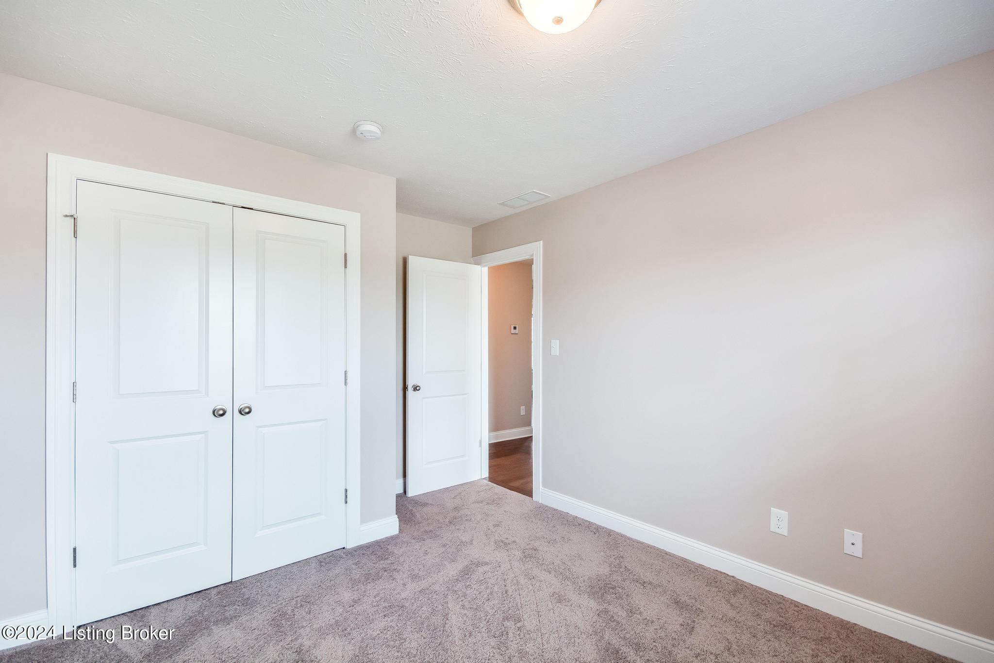 283 Autumn Ridge Drive Mount Washington, KY 40047 - Photo 21 of 41 Bedroom #3 with new carpeting, fresh coat of paint, double door closet, window and access to Full Bath #2.