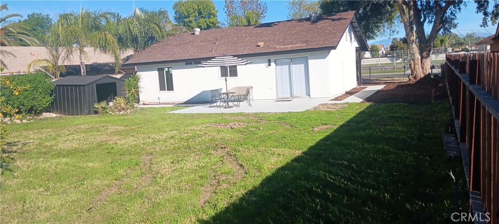 1022 Ruby Drive Perris, CA 92571 - Photo 19 of 27 a view of a house with backyard and sitting area