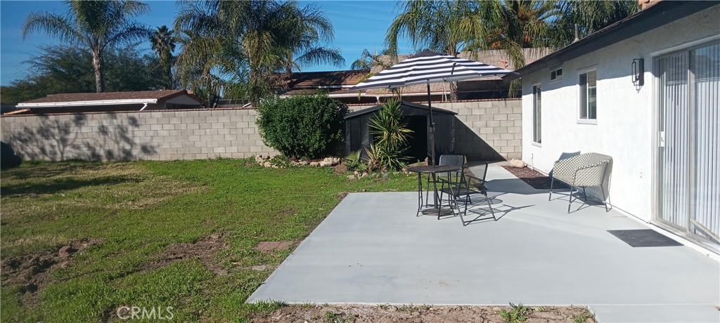 1022 Ruby Drive Perris, CA 92571 - Photo 23 of 27 a view of a chair and table in backyard