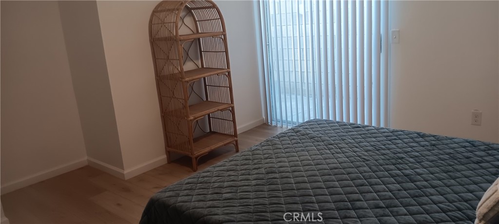 1022 Ruby Drive Perris, CA 92571 - Photo 26 of 27 a view of a livingroom with wooden floor and stairs