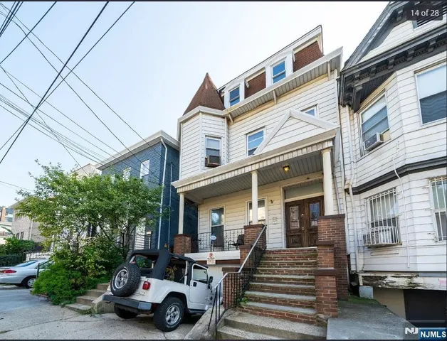a car parked in front of a building