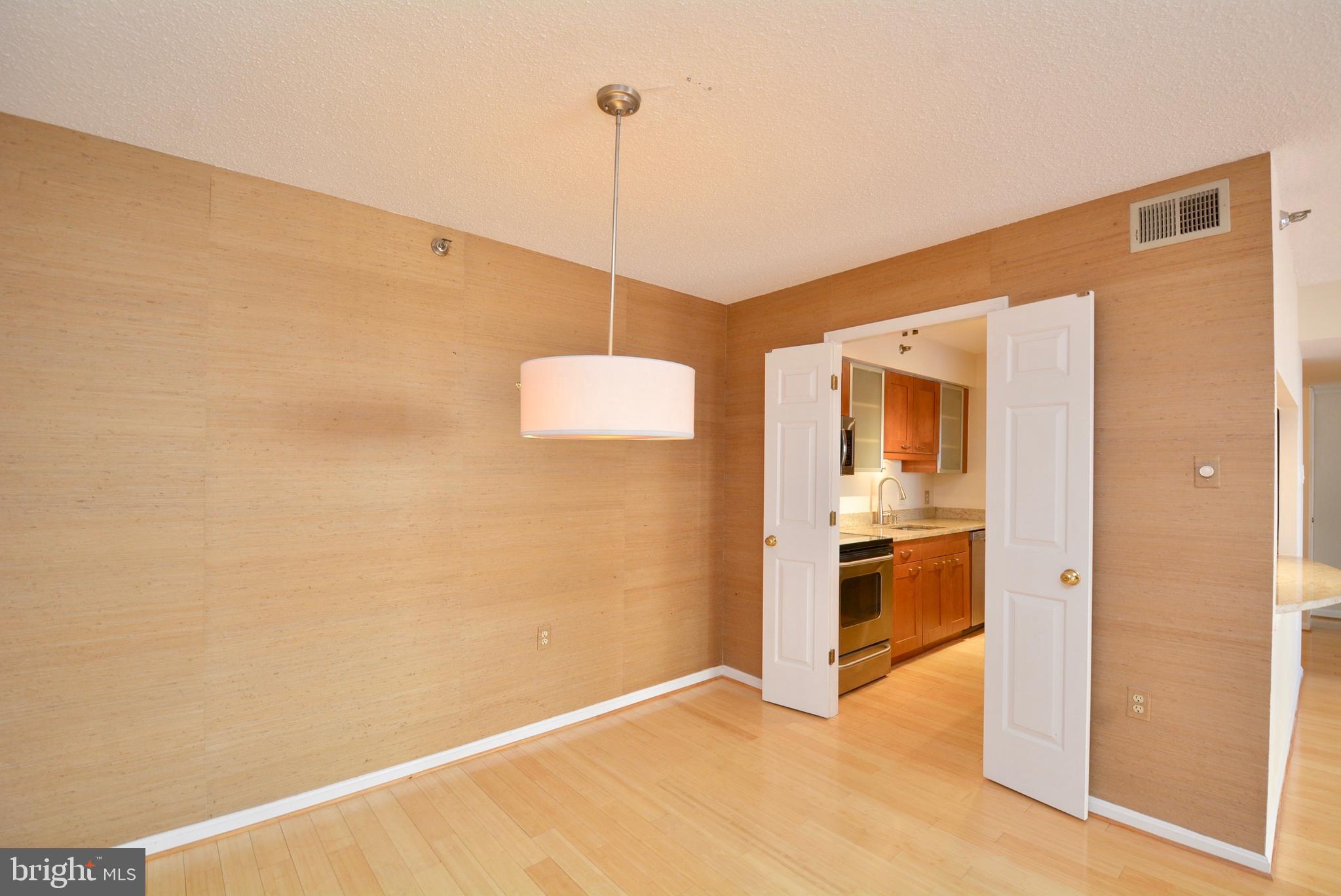 1301 North Courthouse Road, Unit 1512 Arlington, VA 22201 - Photo 16 of 37 Entrance from DR to Kitchen