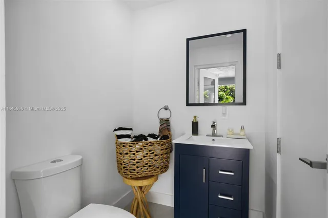 a view of a chairs and table in balcony
