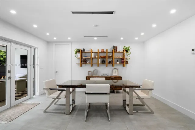 a dining room with furniture and a fireplace