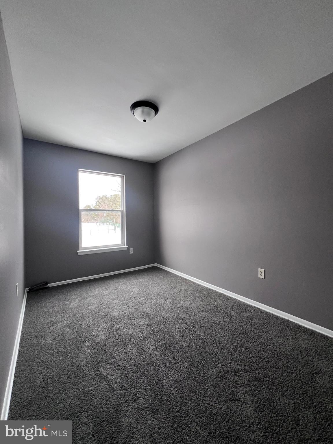 120 Hopkins Court Newark, DE 19713 - Photo 5 of 10 an empty room with a window
