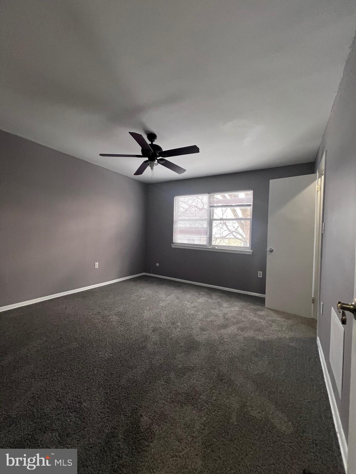 120 Hopkins Court Newark, DE 19713 - Photo 6 of 10 a view of an empty room and window