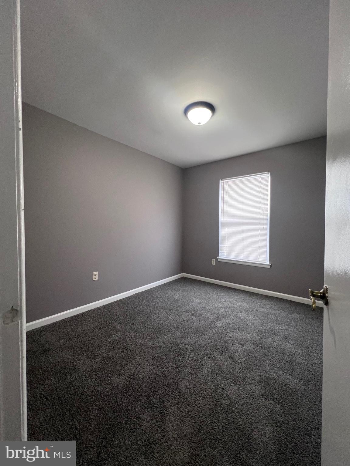 120 Hopkins Court Newark, DE 19713 - Photo 8 of 10 an empty room with a window