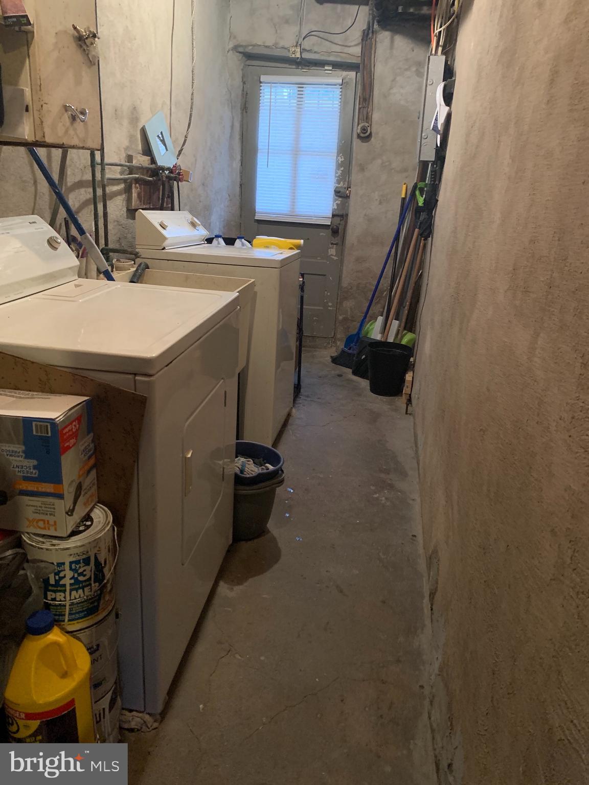 1153 Atwood Road Philadelphia, PA 19151 - Photo 20 of 26 Basement Walkway to rear driveway