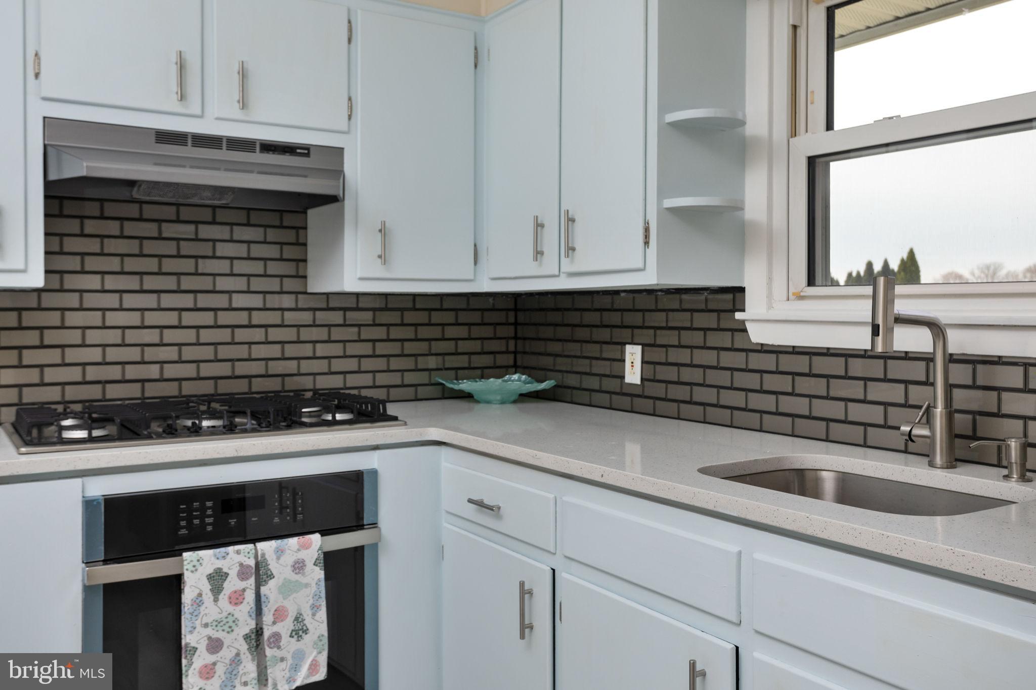 45 Cubberley Road West Windsor, NJ 08550 - Photo 13 of 37 a kitchen with a sink and cabinets