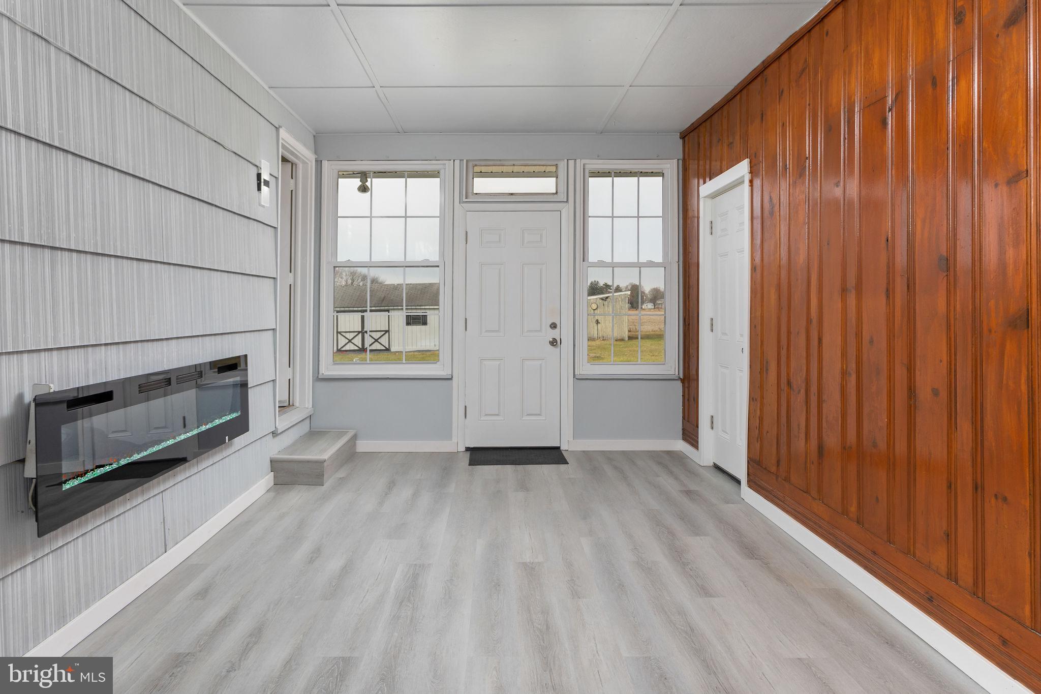 45 Cubberley Road West Windsor, NJ 08550 - Photo 15 of 37 an empty room with windows and fireplace