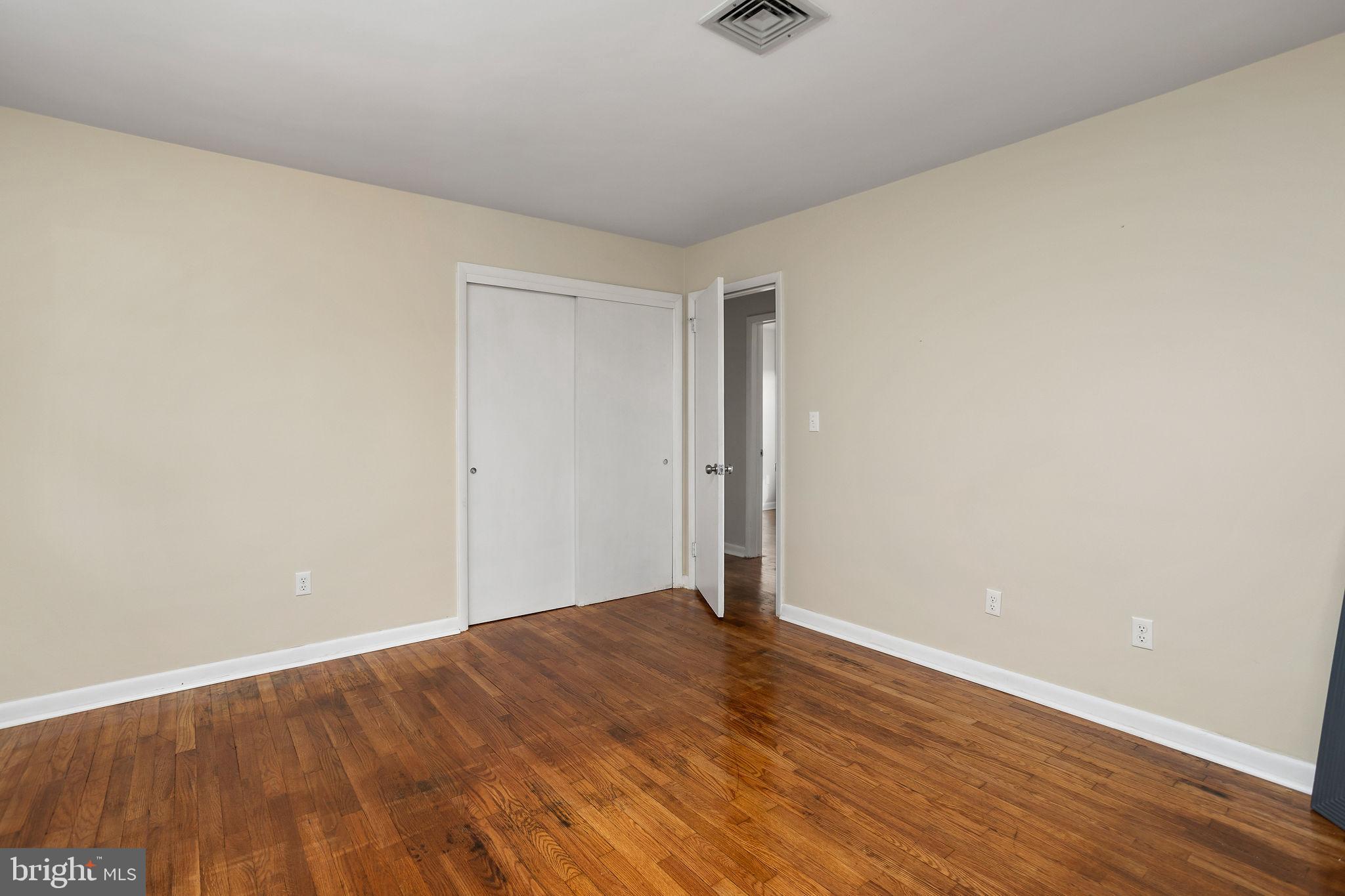 45 Cubberley Road West Windsor, NJ 08550 - Photo 18 of 37 a view of an empty room and wooden floor