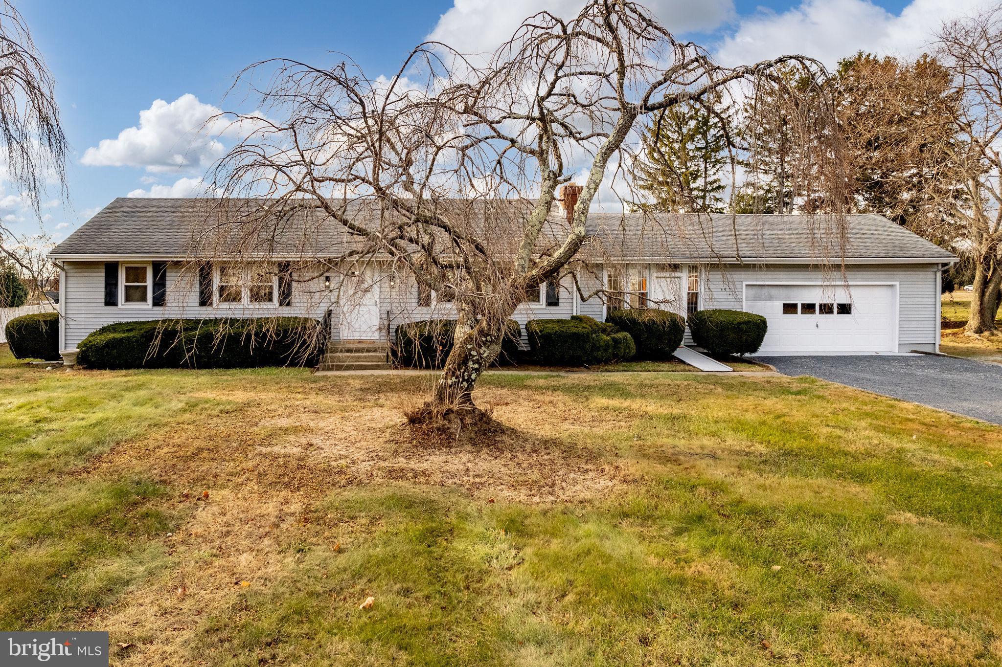 45 Cubberley Road West Windsor, NJ 08550 - Photo 2 of 37 a front view of a house with a yard
