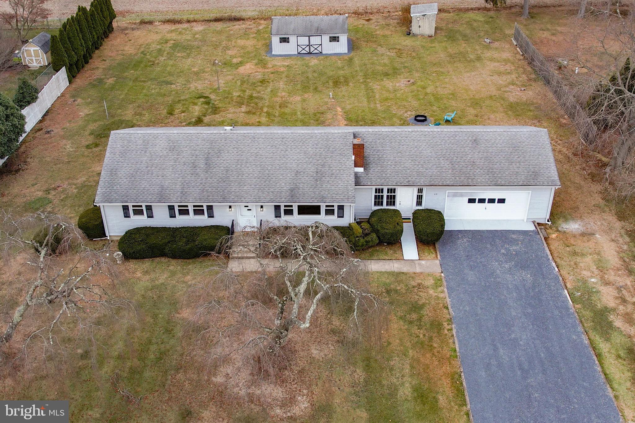 45 Cubberley Road West Windsor, NJ 08550 - Photo 35 of 37 an aerial view of a house with swimming pool and large trees