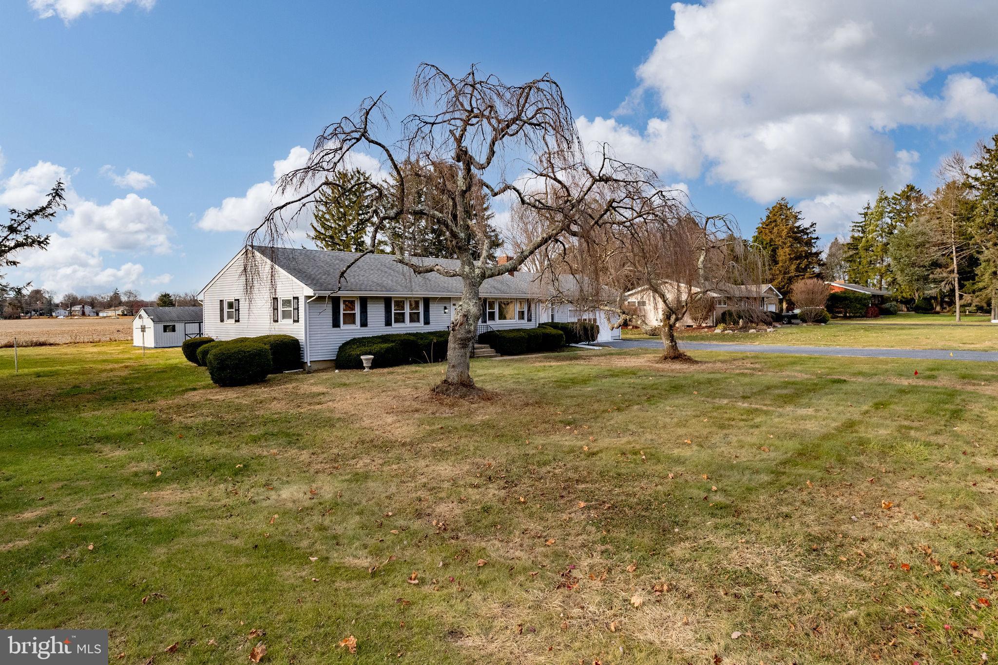 45 Cubberley Road West Windsor, NJ 08550 - Photo 4 of 37 a view of swimming pool with outdoor seating and covered with trees