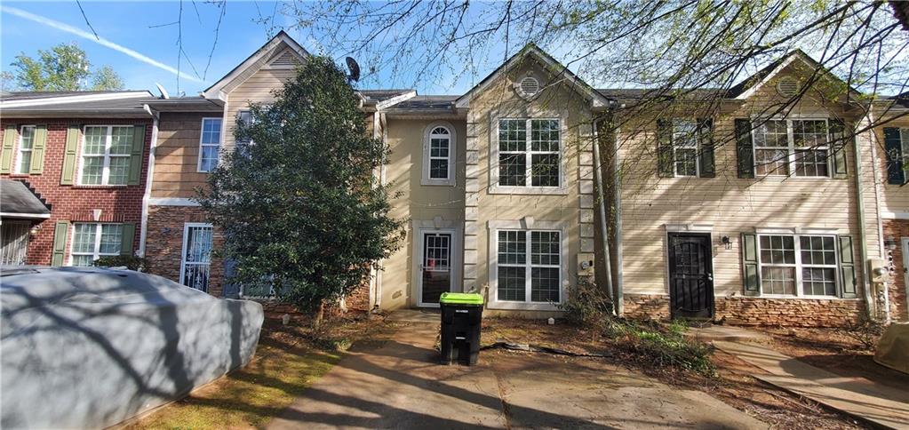 4010 Browne Court Conley, GA 30288 - Photo 1 of 1 a front view of a house with a yard