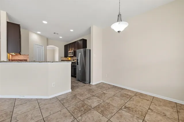 a view of a kitchen with a sink