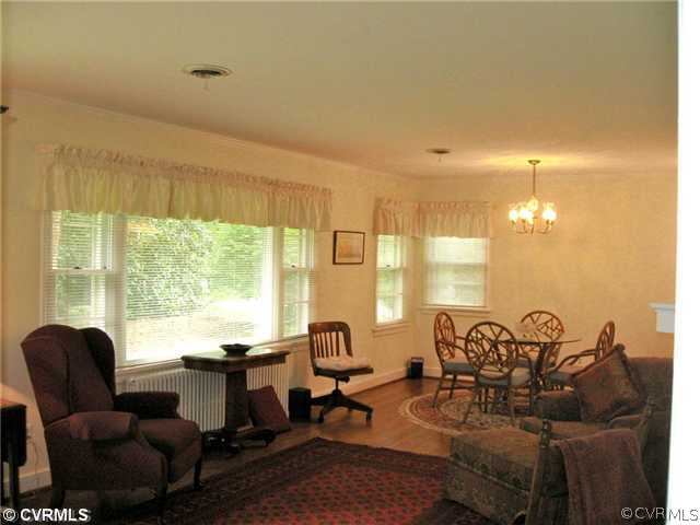 4406 Butte Road Richmond, VA 23235 - Photo 4 of 12 a living room with furniture and a large window