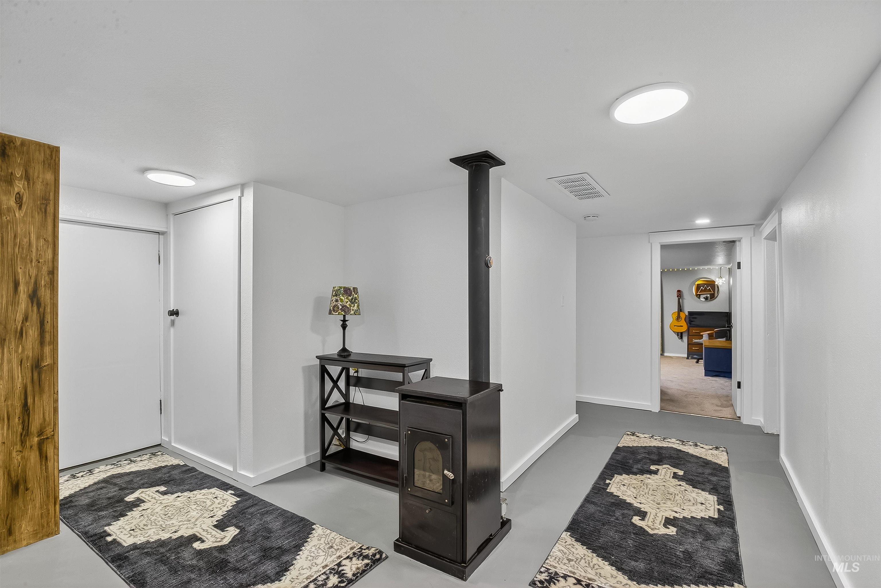 2157 Lukes Gulch Road Stites, ID 83552 - Photo 35 of 50 Entryway featuring baseboards and finished concrete floors
