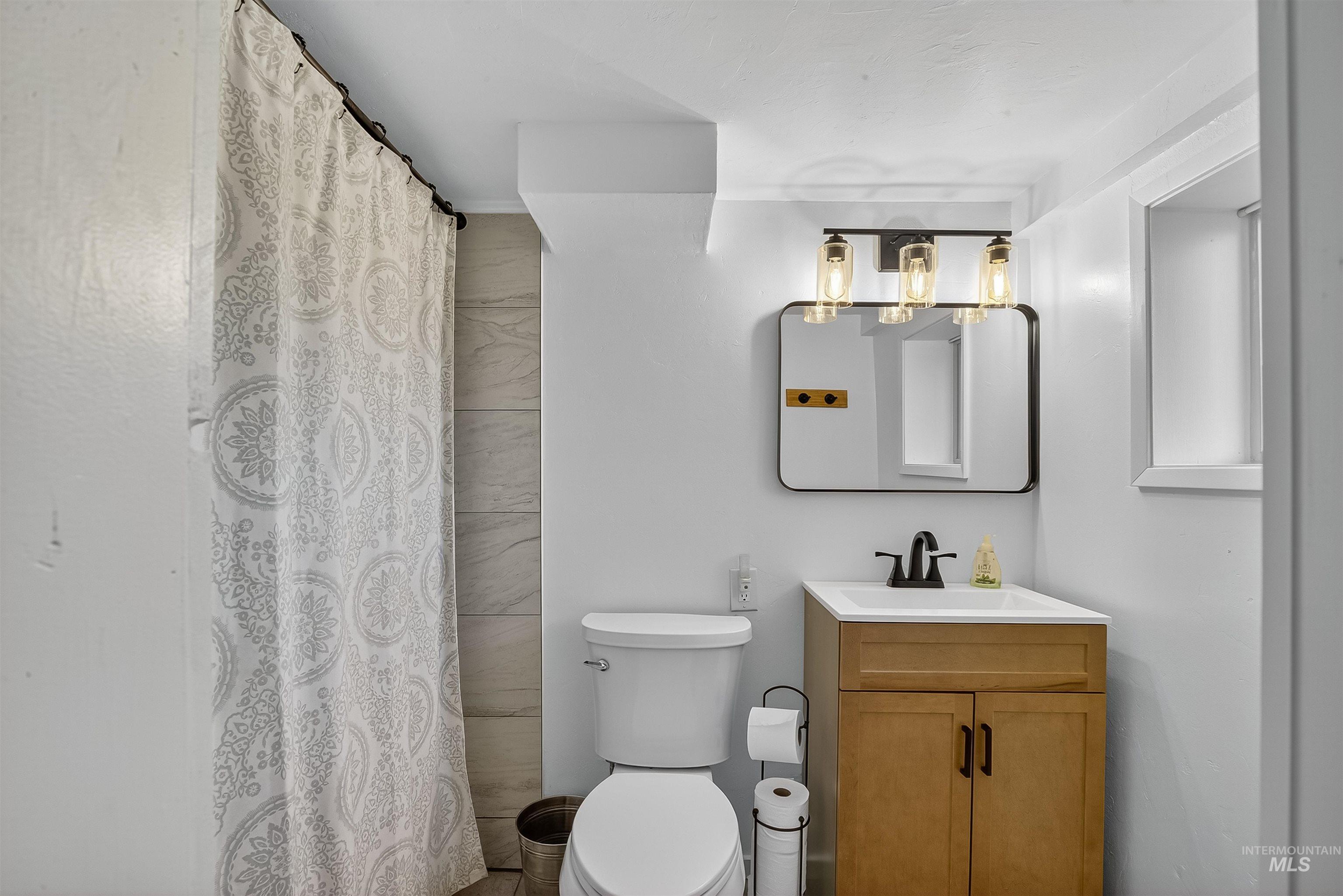 2157 Lukes Gulch Road Stites, ID 83552 - Photo 37 of 50 Full bathroom featuring vanity and a stall shower
