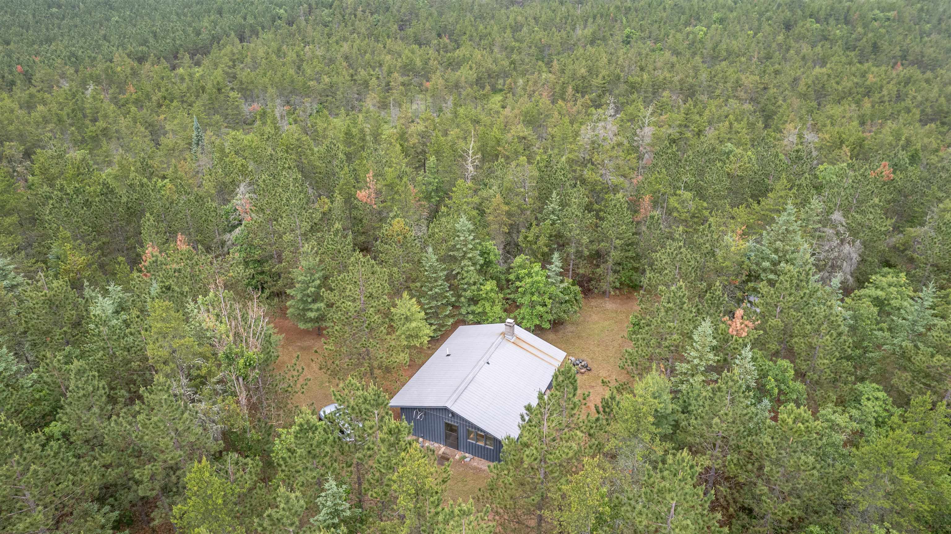 11321 East Town Line Road Solon Springs, WI 54873 - Photo 24 of 31 View of property location featuring a heavily wooded area