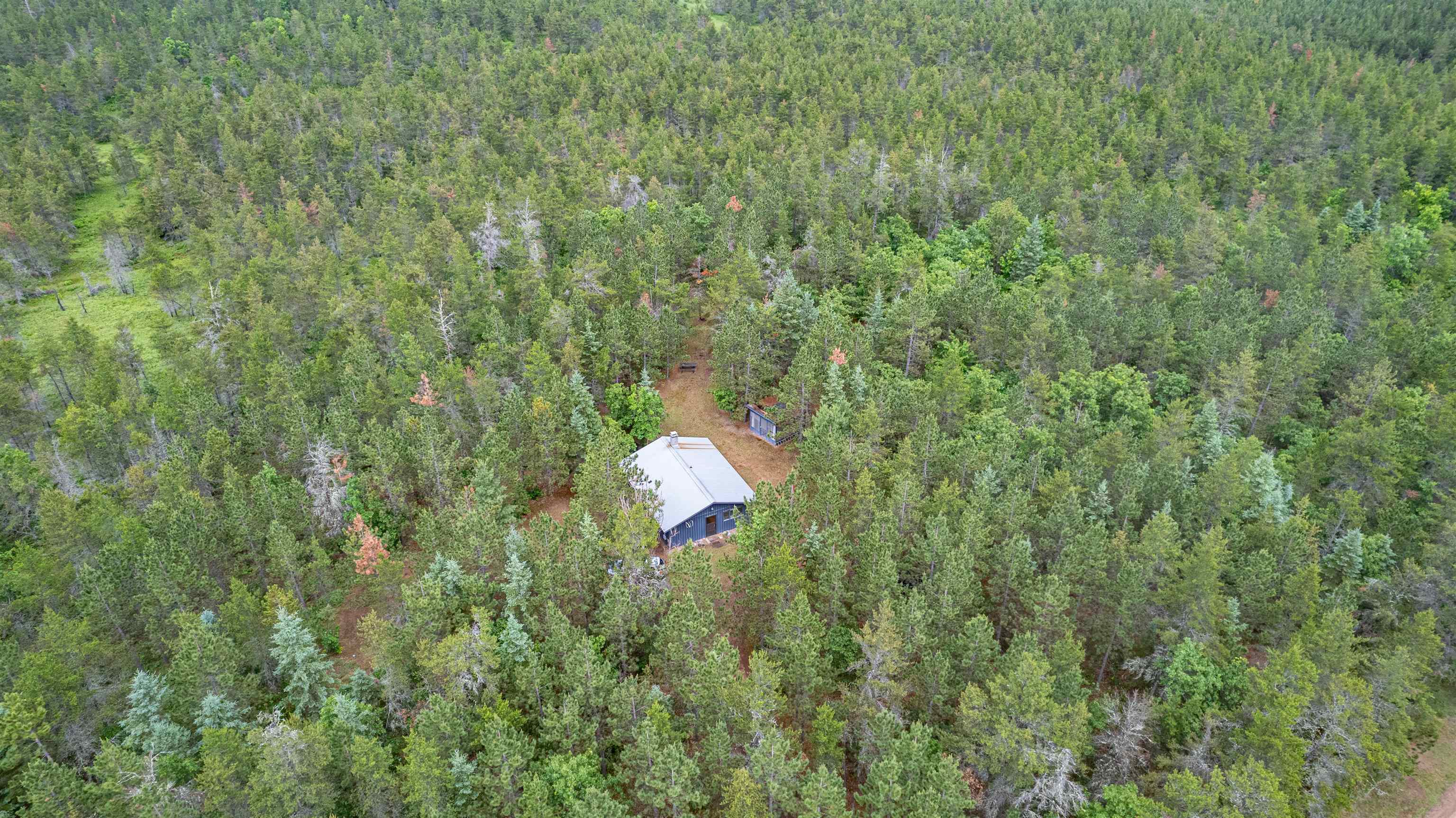 11321 East Town Line Road Solon Springs, WI 54873 - Photo 25 of 31 View of property location with a heavily wooded area