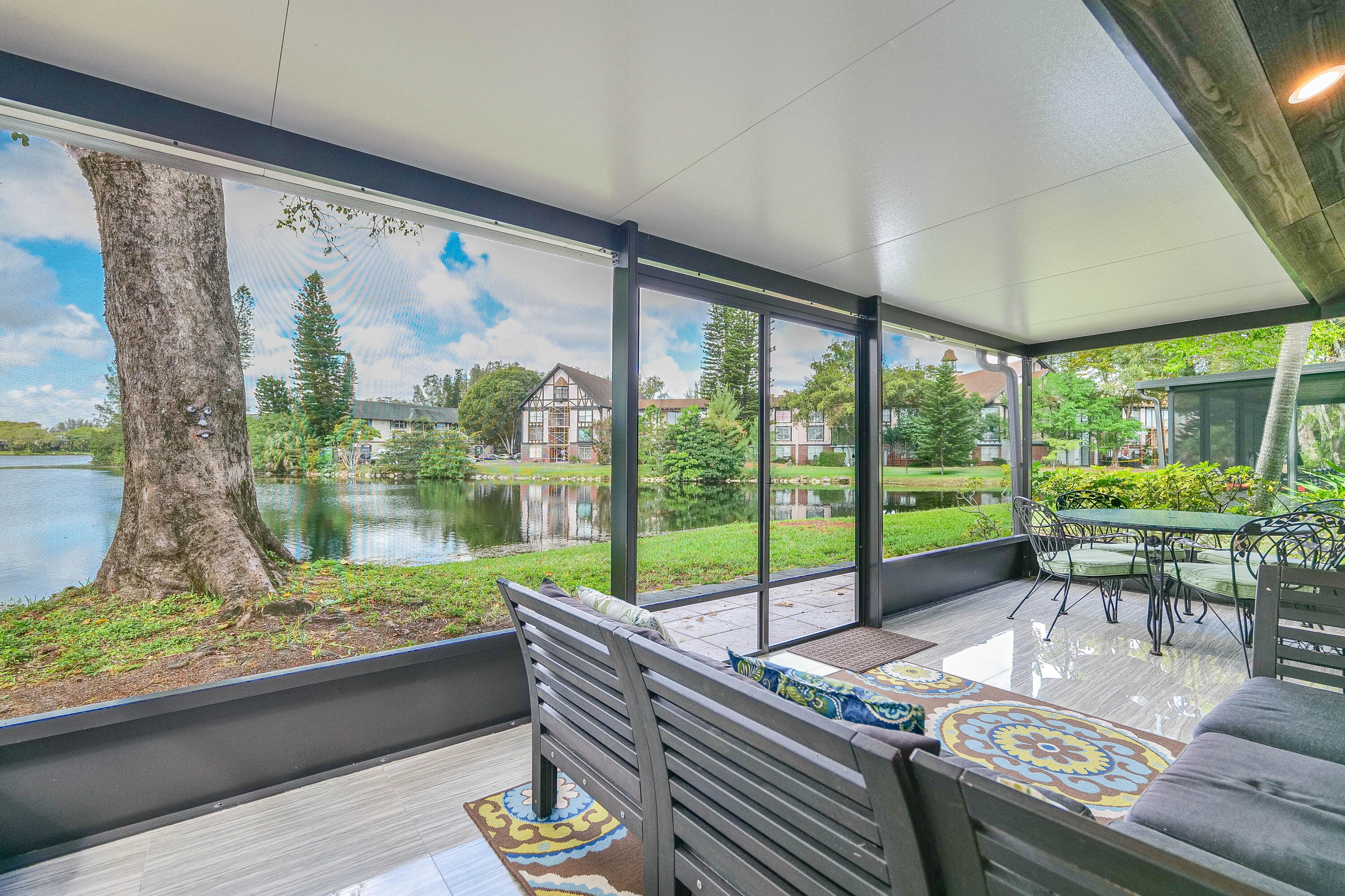 5535 Constant Spring Terrace, Unit 216 Lauderhill, FL 33319 - Photo 1 of 51 a room with pool table and chairs