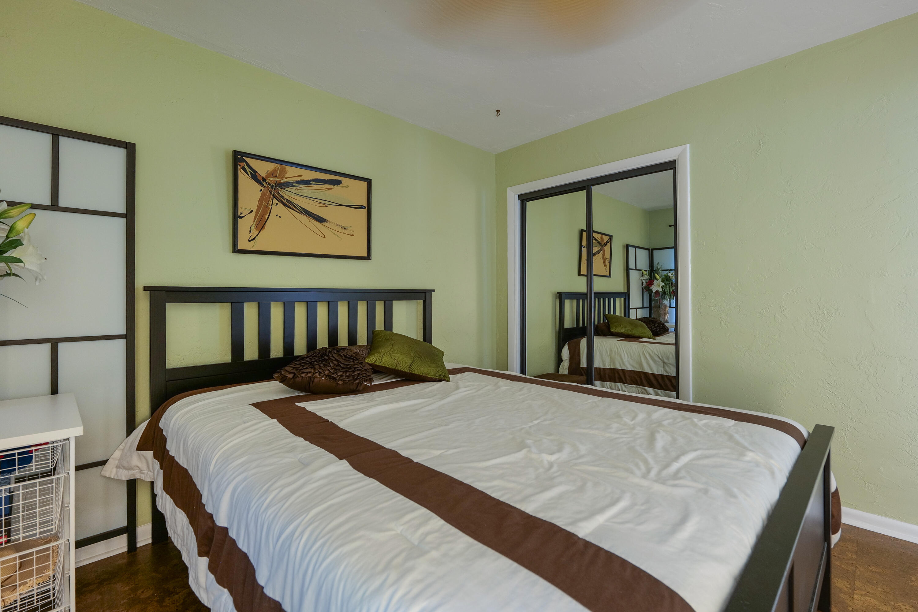 5535 Constant Spring Terrace, Unit 216 Lauderhill, FL 33319 - Photo 19 of 51 a bed sitting in a bedroom next to a window