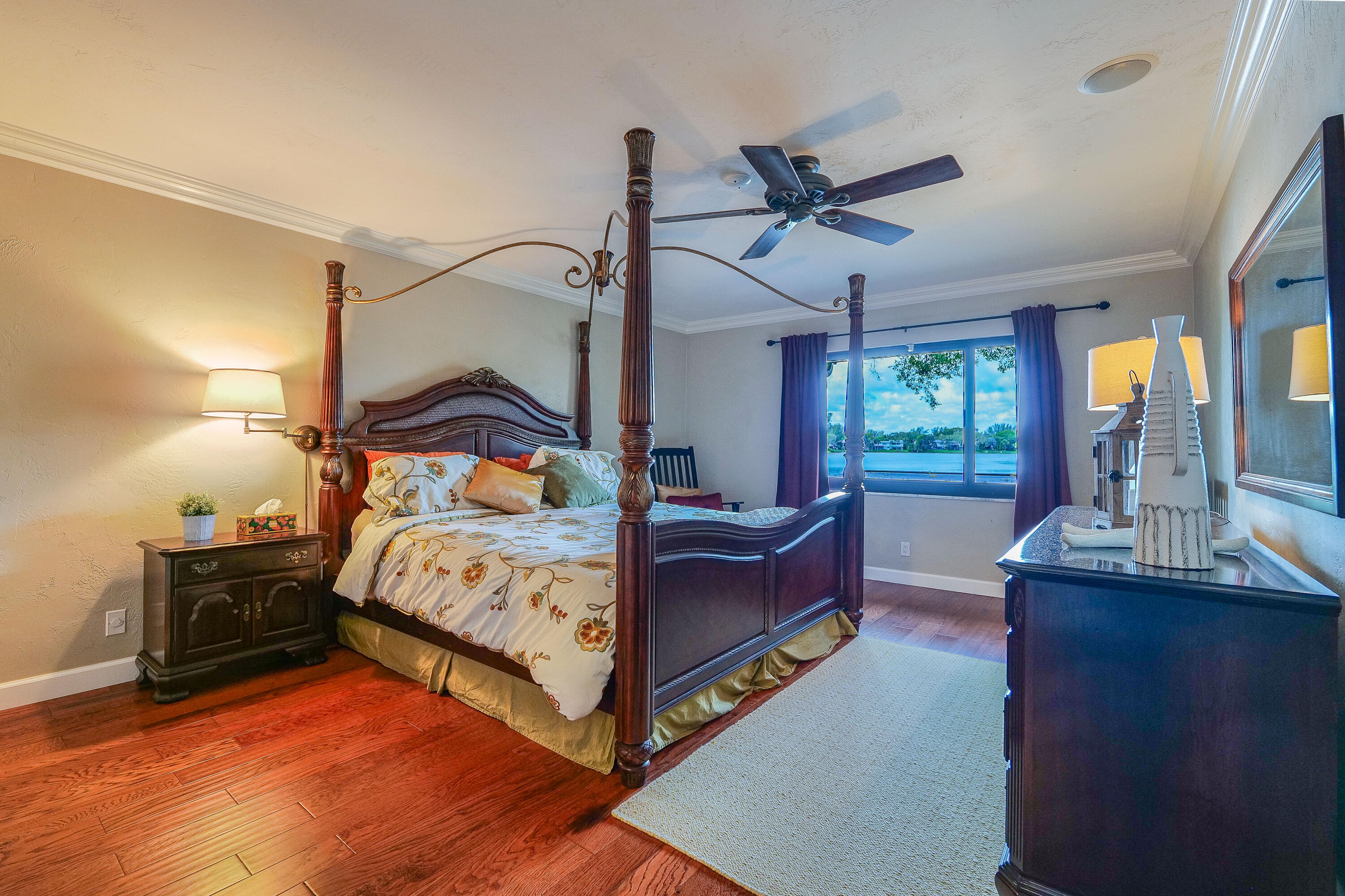 5535 Constant Spring Terrace, Unit 216 Lauderhill, FL 33319 - Photo 23 of 51 a bedroom with a bed and window