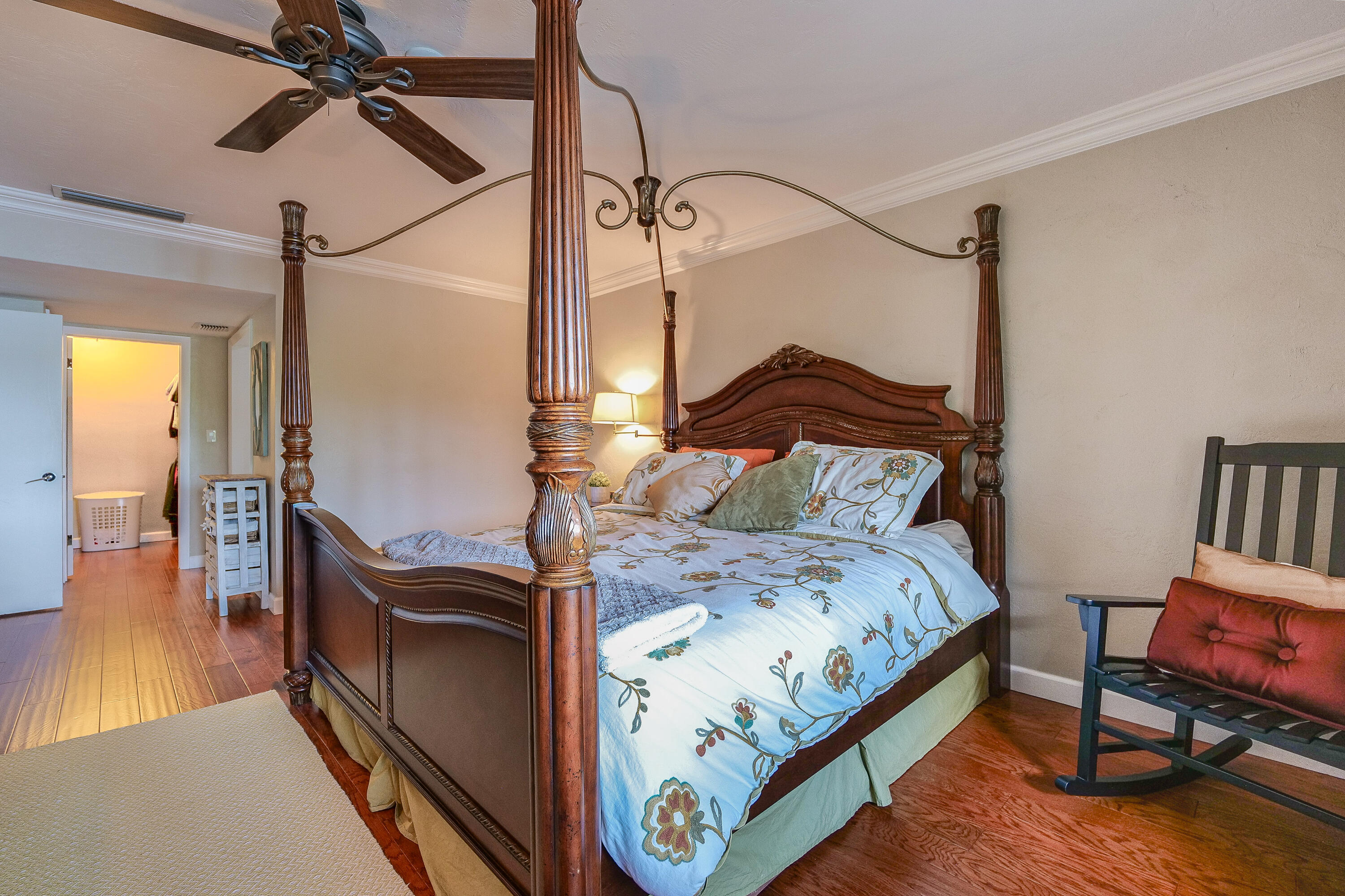 5535 Constant Spring Terrace, Unit 216 Lauderhill, FL 33319 - Photo 24 of 51 a bedroom with a bed and wooden floor