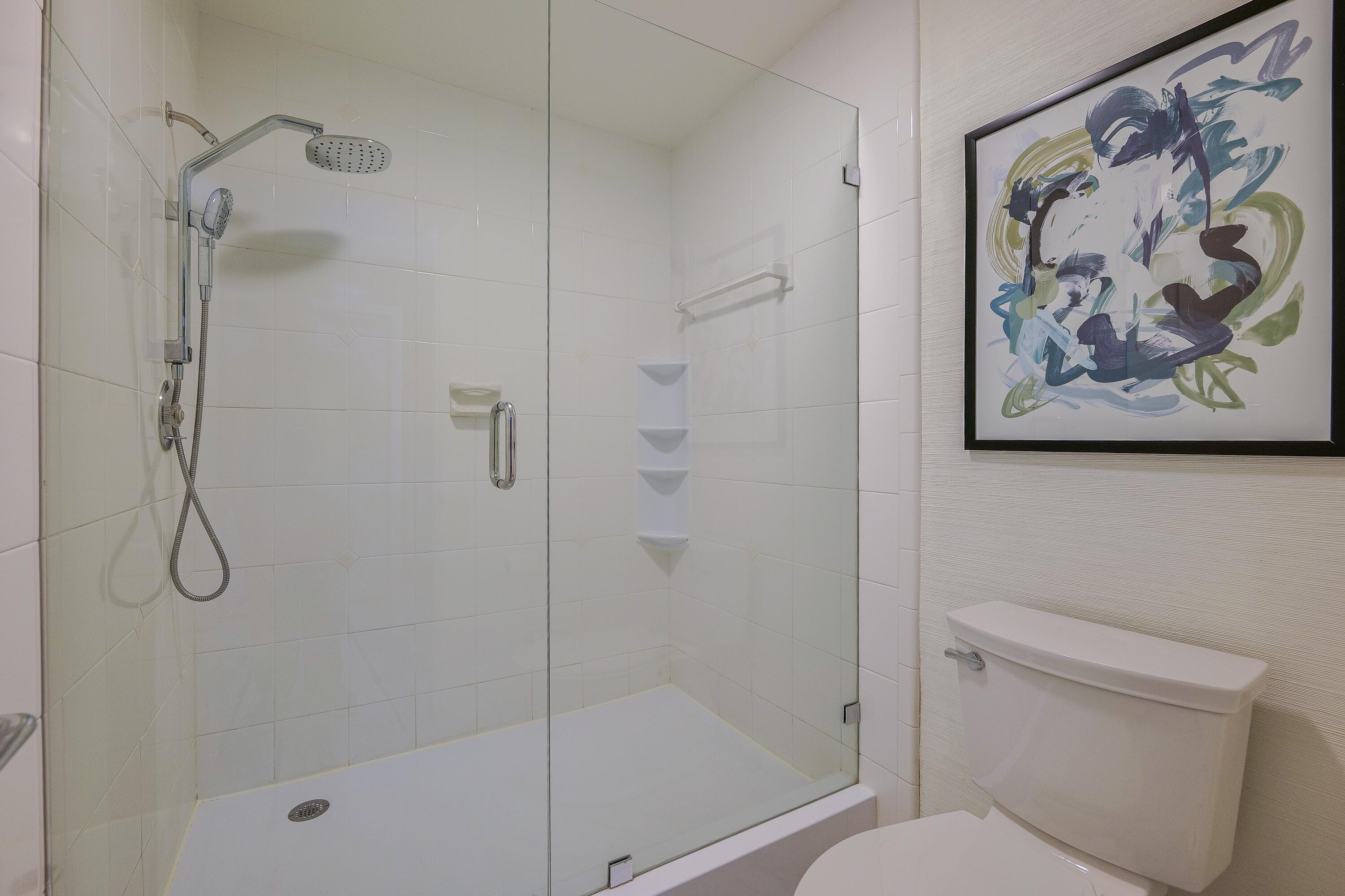 5535 Constant Spring Terrace, Unit 216 Lauderhill, FL 33319 - Photo 28 of 51 a bathroom with a shower and a toilet