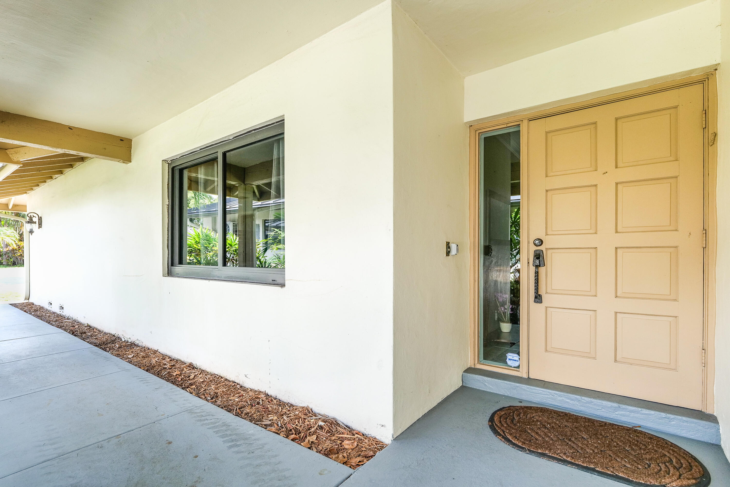 5535 Constant Spring Terrace, Unit 216 Lauderhill, FL 33319 - Photo 35 of 51 a view of an entryway with wooden floor