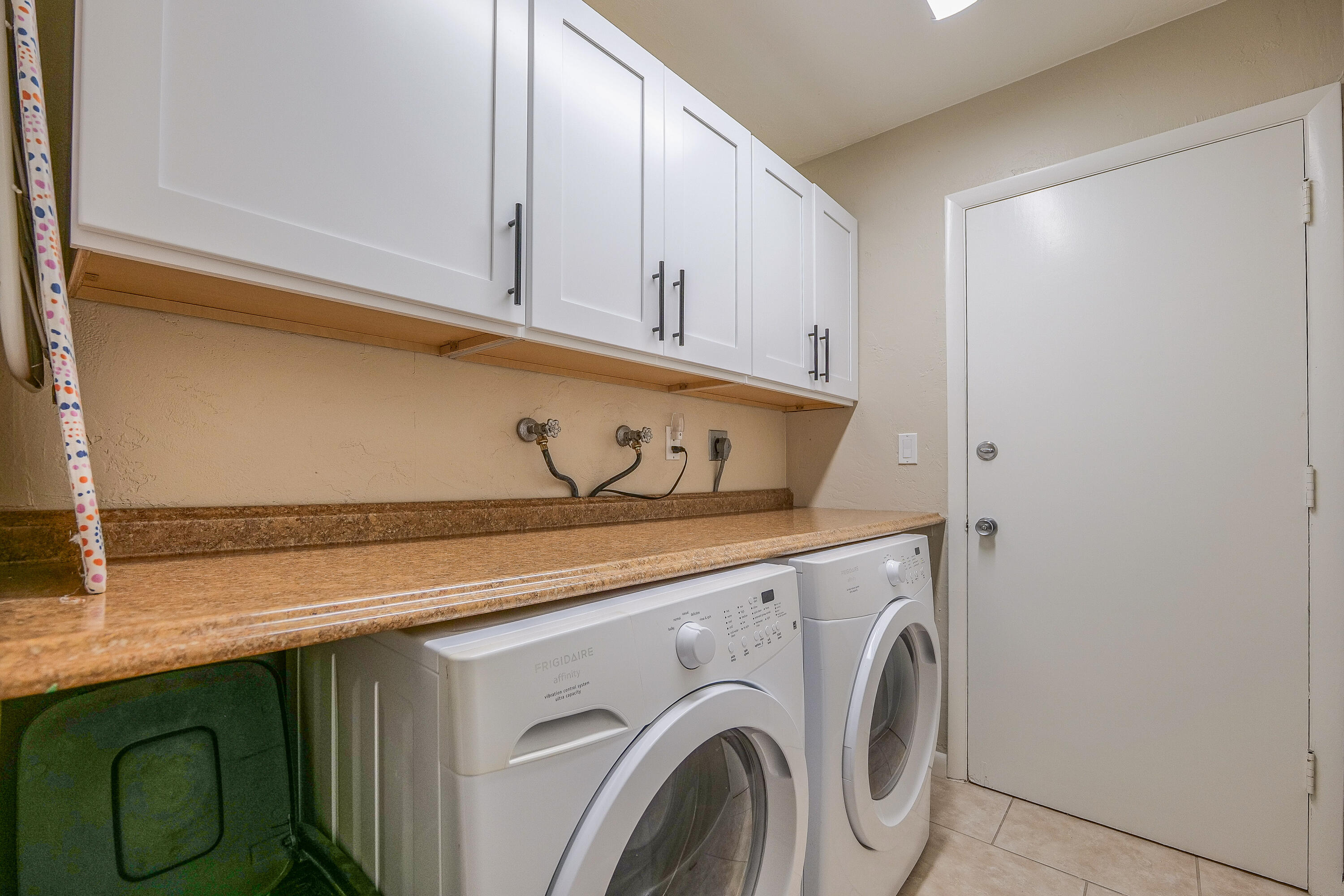 5535 Constant Spring Terrace, Unit 216 Lauderhill, FL 33319 - Photo 36 of 51 a utility room with dryer and washer