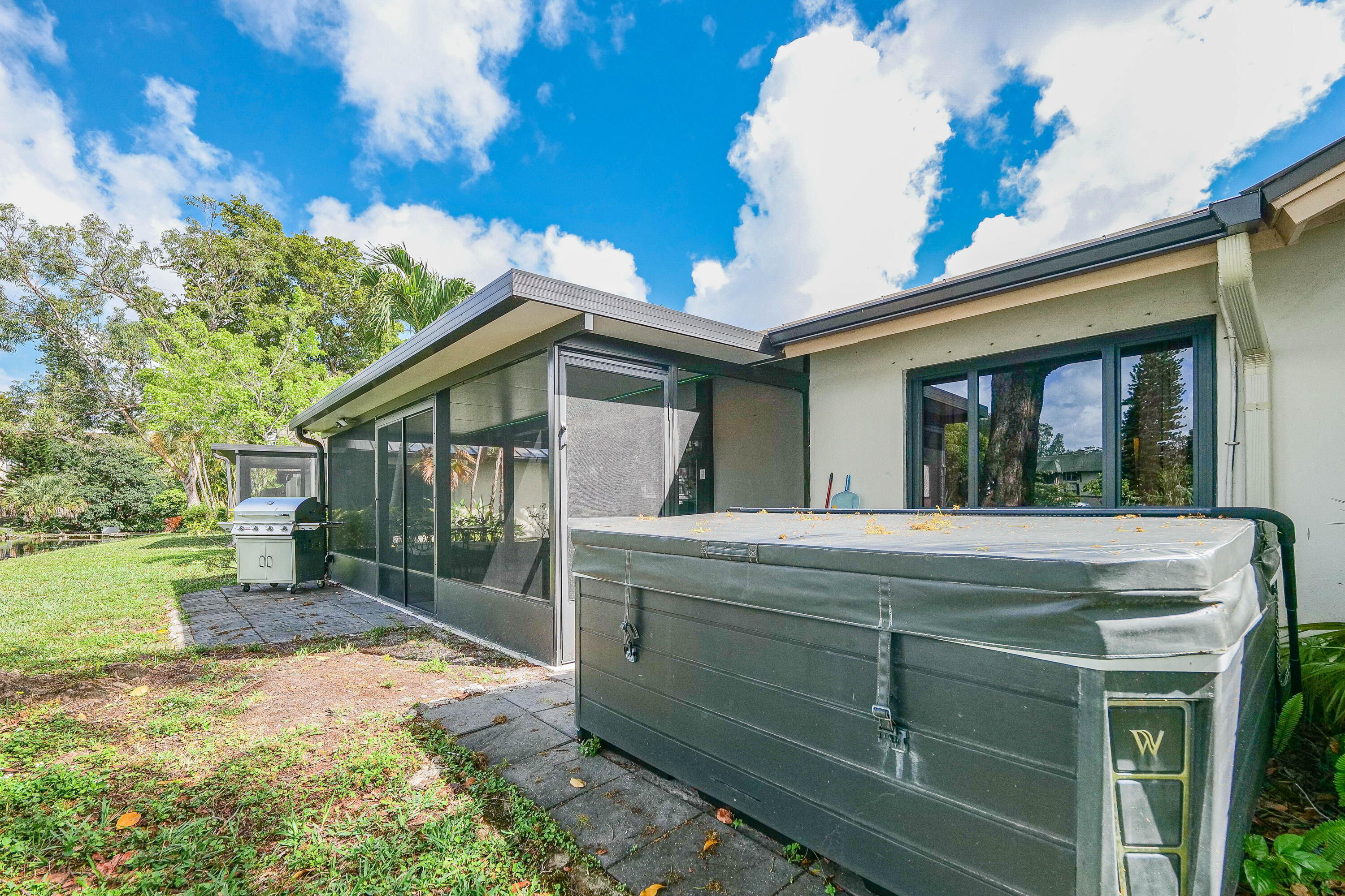 5535 Constant Spring Terrace, Unit 216 Lauderhill, FL 33319 - Photo 38 of 51 a view of a house with a yard
