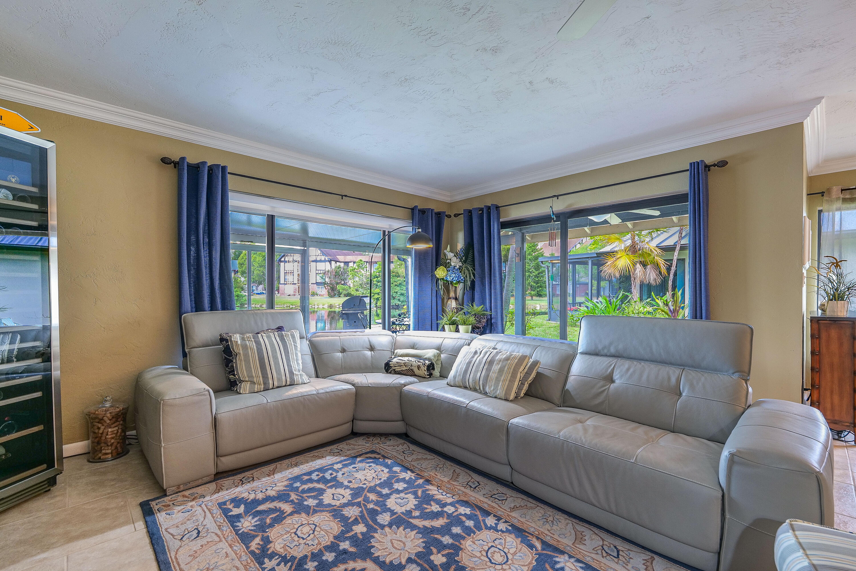 5535 Constant Spring Terrace, Unit 216 Lauderhill, FL 33319 - Photo 4 of 51 a living room with furniture and a large window